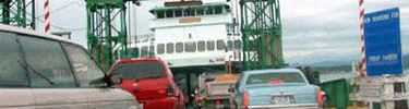 Automobiles board a Washington State Ferries vessel in Anacortes.
